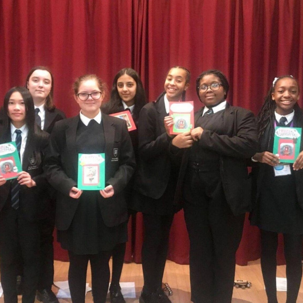 Coop Academy North Manchester Pupils sing carols to the residents of